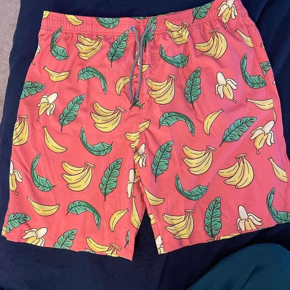 New XXL Men’s Board Shorts Banana pattern.  Built in mash, brief Quick drying